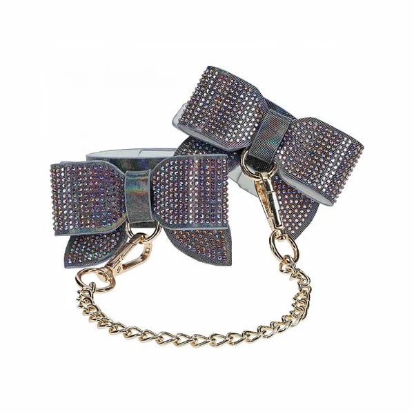 Ouch! Paris Collection Iridescent Leather Adjustable Leg Cuffs With Bedazzled Bow Accent